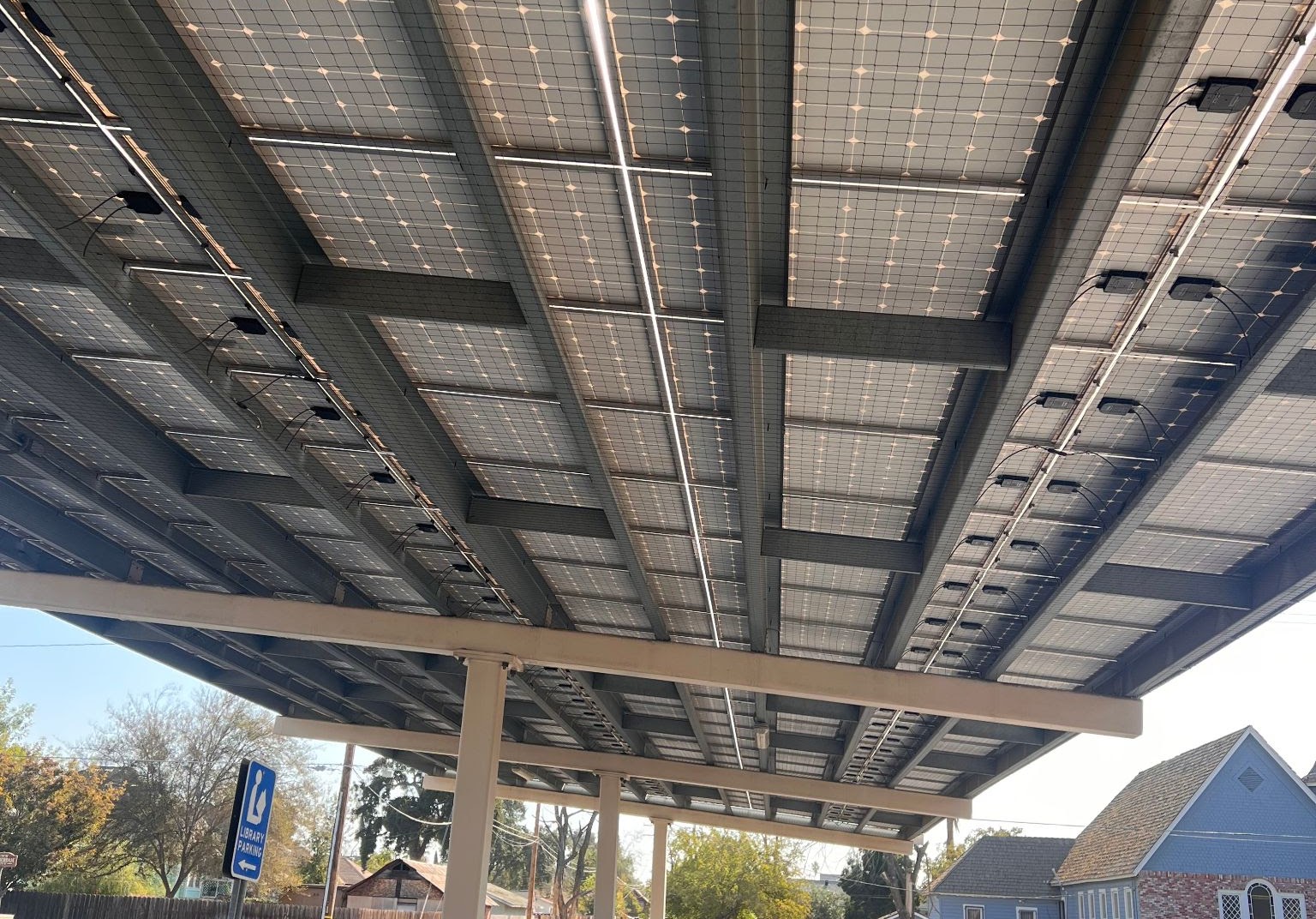 Bird exclusion mesh installed around the underside of a solar panel array